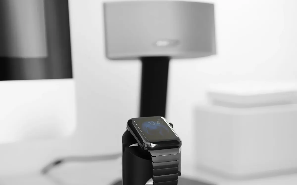 An Apple Watch resting on a magnetic charging puck